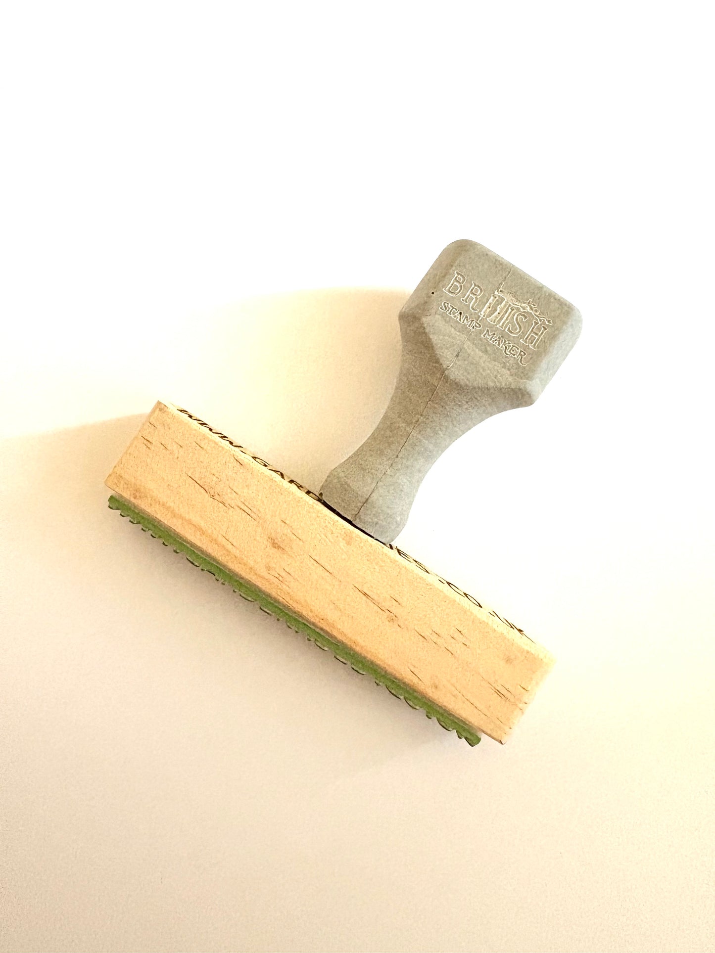 A single line of text rubber stamp perfect for clothing composition stamps