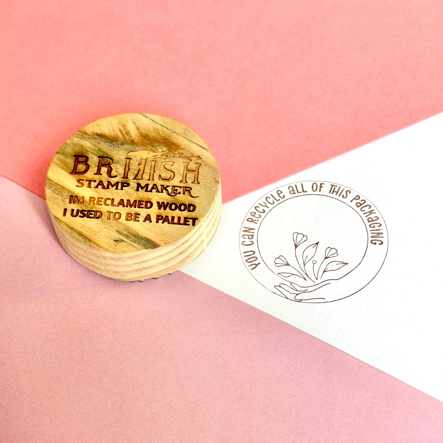 Hands holding flowers with the words you can recycle all of this around the top. Reclaimed wood stamp made by British stamp maker